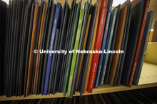 Approximately 3,000 scores of scores line the shelves in the library. Anita Breckbill, professor, ov
