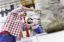 Mohammadreza Farooghi Mehr and Gabriela Yáñez mark a slab on a large shake table in Christine Witt