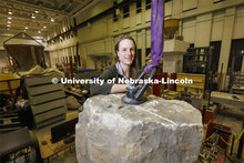 Christine Wittich, Assistant Professor of Civil and Environmental Engineering, with a slab on a larg