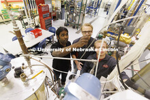Aingaran Bala Raman, Ethan Yungdahl and Josiah Kolar examine a bioreactor in Hunter Flodman’s UO L
