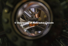 A sample is supported in a modular high vacuum laser processing system in Craig Zuhlke’s lab. Coll