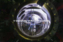 A sample is supported in a modular high vacuum laser processing system in Craig Zuhlke’s lab. Coll