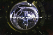 A sample is supported in a modular high vacuum laser processing system in Craig Zuhlke’s lab. Coll