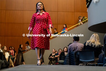 Students walk across the runway wearing designs from local independent retailers during the Global G