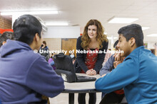 Katie Bevins talks with students in the commons before school begins. Bevins is a school psychologis