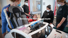 Four-year-old Dayana Torres gets a first look at the new, battery-powered car that UNL and UNMC stud