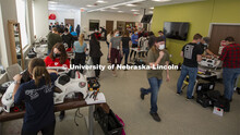 Hunter Purcell (center, in green), junior biological systems engineering major, hustles to retrieve 
