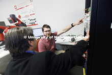 Matthew Boeding and Hamid Sherif discuss a project in Hamid Sherif’s Telecom lab. College of Engin