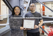 Jinying Zhu and Bibo Zhong. College of Engineering photo shoot at Peter Kiewit Institute in Omaha. A