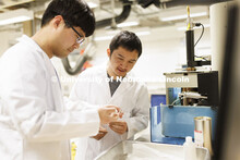 Dong-Hwa Noh and Hung Van work on a mercury intrusion test in Seunghee Kim’s lab. College of Engin
