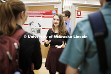 Maggie Ramsey talks about her chemistry research project. Undergraduate Student Poster Session in th