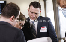 Ryan Sullivan, Associate Professor of Law, works with his students and clients in the Lancaster Coun