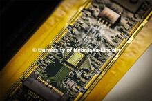 Close up of a circuit being assembled for the Large Hadron Collider in Jorgensen Hall. Nebraska’s 