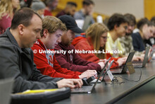 Students listening to a lecture in McCollum Hall. College of Law photo shoot. April 20, 2022. 