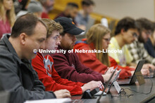 Students listening to a lecture in McCollum Hall. College of Law photo shoot. April 20, 2022. 