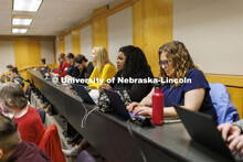 Students listening to a lecture in McCollum Hall. College of Law photo shoot. April 20, 2022. 