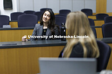 Students collaborating in a lecture hall in McCollum Hall. College of Law photo shoot. April 20, 202