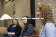 Students gathered in the hallway in McCollum Hall. College of Law photo shoot. April 20, 2022. 