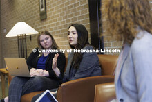Students gathered in the hallway in McCollum Hall. College of Law photo shoot. April 20, 2022. 