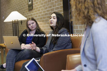Students gathered in the hallway in McCollum Hall. College of Law photo shoot. April 20, 2022. 