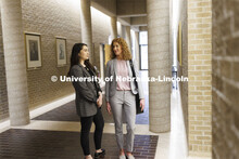 Students walking to class in McCollum Hall. College of Law photo shoot. April 20, 2022. 