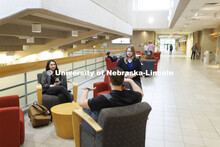 Students hanging out socializing in the hallway. College of Law photo shoot. April 20, 2022. 