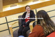 Students hanging out socializing in the hallway. College of Law photo shoot. April 20, 2022. 