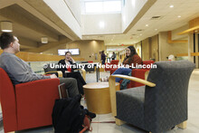 Students hanging out socializing in the hallway. College of Law photo shoot. April 20, 2022. 