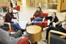 Students hanging out socializing in the hallway. College of Law photo shoot. April 20, 2022. 