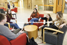 Students hanging out socializing in the hallway. College of Law photo shoot. April 20, 2022. 