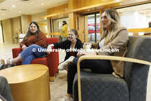 Students hanging out socializing in the hallway. College of Law photo shoot. April 20, 2022. 