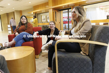 Students hanging out socializing in the hallway. College of Law photo shoot. April 20, 2022. 
