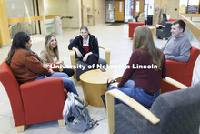 Students hanging out socializing in the hallway. College of Law photo shoot. April 20, 2022. 