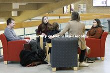 Students hanging out socializing in the hallway. College of Law photo shoot. April 20, 2022. 