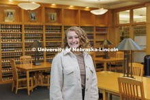 Individual students pictured in the Schmid Law Library. College of Law photo shoot. April 20, 2022. 