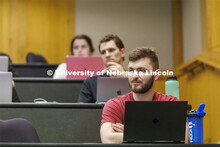 Students listening to a lecture in McCollum Hall. College of Law photo shoot. April 20, 2022. 
