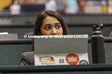 Students taking notes in class. College of Law photo shoot. April 20, 2022. 