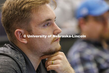 Headshot of a young man listening in class. College of Law photo shoot. April 20, 2022. 