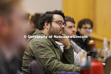 Students listening to a lecture. College of Law photo shoot. April 20, 2022. 