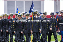 Navy and Marine ROTC cadets pass in review. ROTC Joint Service Chancellor’s Review in Cook Pavilio