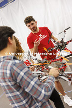 Santiago Giraldo discusses UAVs in the NIMBUS lab. College of Engineering photoshoot in the School o