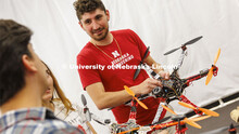 Santiago Giraldo discusses UAVs in the NIMBUS lab. College of Engineering photoshoot in the School o