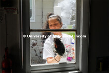 Alpha Xi Delta assist with raking leaves, trimming shrubs, window cleaning & door cleaning general y