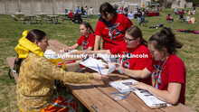 UNITE members register Kaira Wolfe, who served as the head woman dancer during the powwow. 2022 UNIT