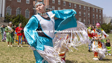Fringe on the regalia of Stevie Horse, a member of the Ponca and Lakota tribe, flutters in the wind 