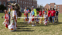 Members of UNITE (at right) dance in the circle during an intertribal portion of the powwow. 2022 UN