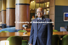 Dipra Jha stands inside the completed Scarlet Hotel. As a HTRM professor, he was instrumental at get