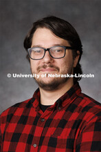 Studio portrait of Jake Kluczynski, Senior Workstation Support Associate. Portraits of Extension, IA