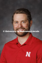 Studio portrait of Dylan Mangel, Assistant Professor, Plant Pathology. Portraits of Extension, IANR 