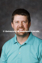 Studio portrait of Nathan Mueller, Water and Integrated Cropping Systems (WICS) Extension Educator. 